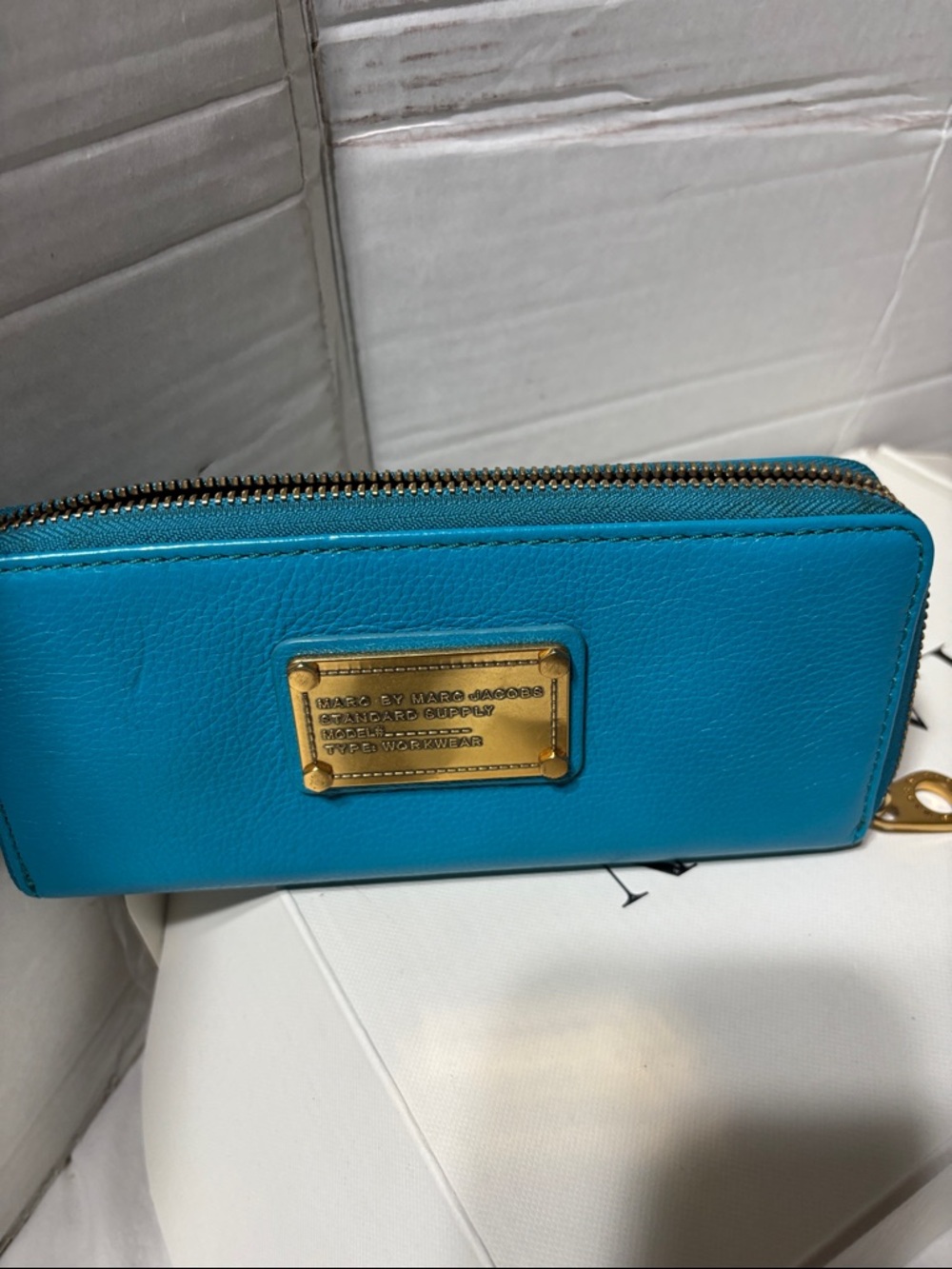 Marc by Marc Jacobs Turquoise Leather Zip Wallet with Gold Plaque.